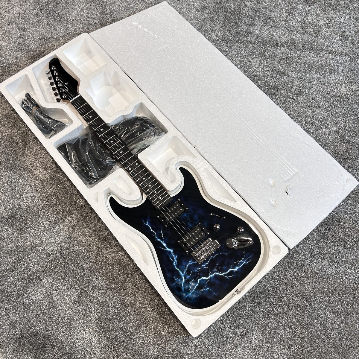 Full-Size Electric Guitar with White Lightning Finish HH Pickups, Gig Bag & More13