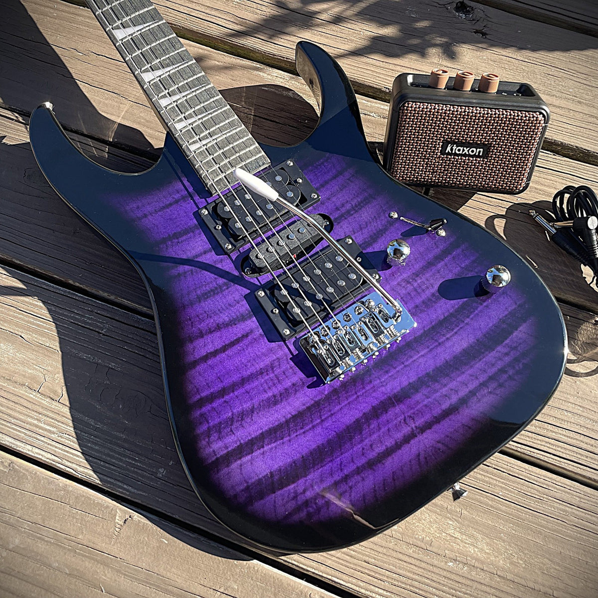 Full-Size Purple Electric Guitar and 5-Watt Amp Starter Package with Accessories1
