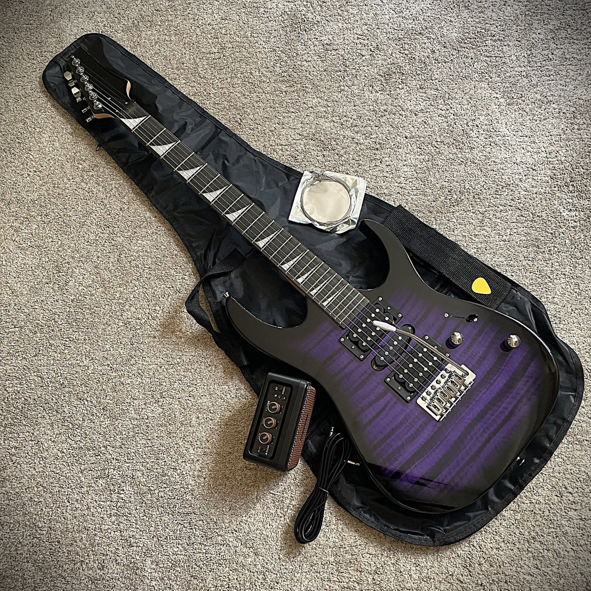 Full-Size Purple Electric Guitar and 5-Watt Amp Starter Package with Accessories17
